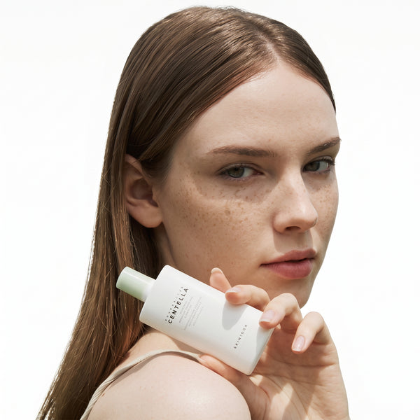 MADAGASCAR CENTELLA TEA-TRICA SOOTHING SUN MILK - SKIN1004